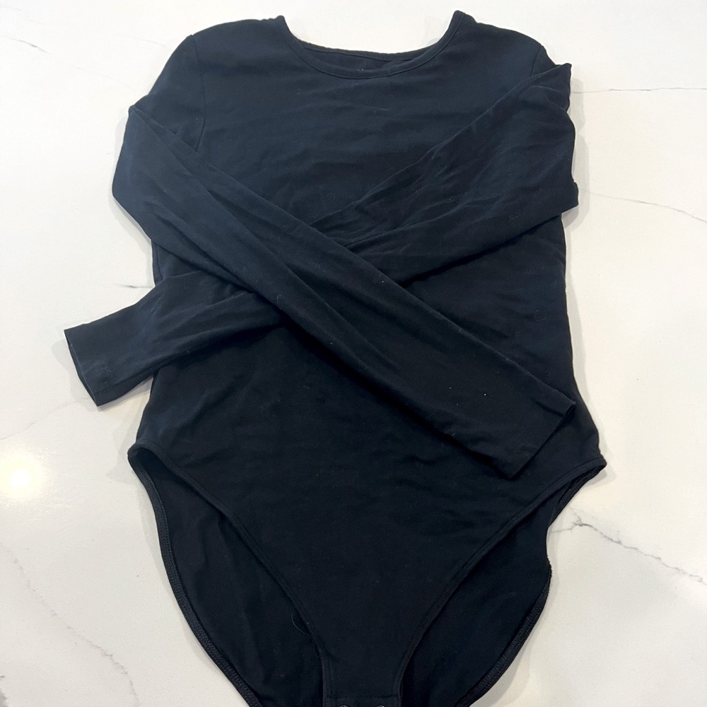 Black long sleeve bodysuit.